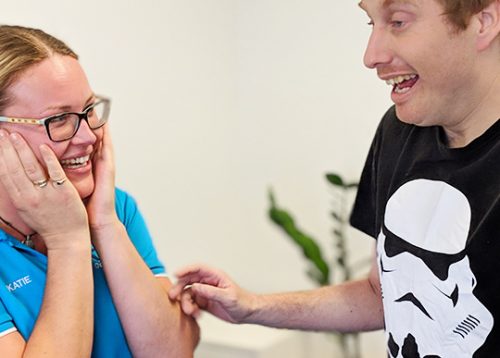 Katie, a psychologist at Kern Allied Health, talks with one of her clients