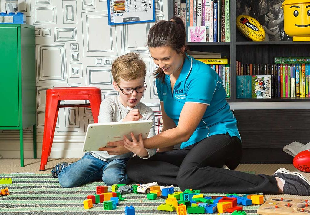 Kern Allied Health therapist working with a child